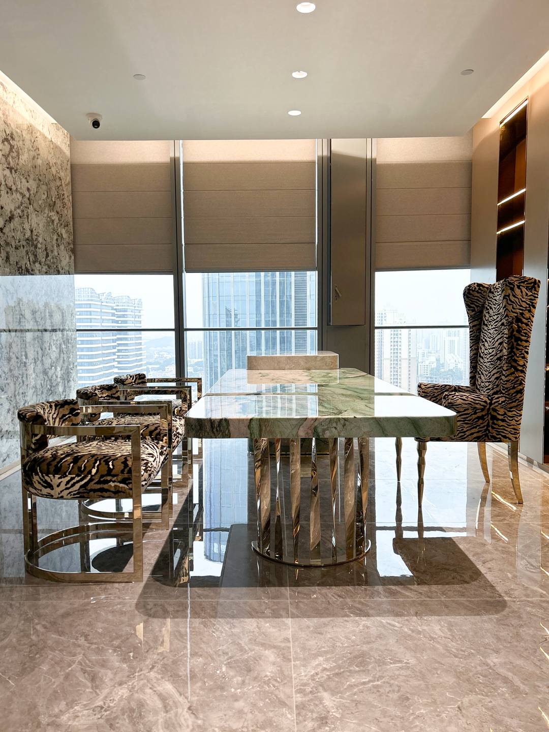 The same table from the window side, looking across the city